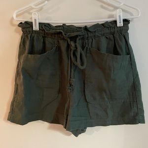 Hunter green high waisted shorts.